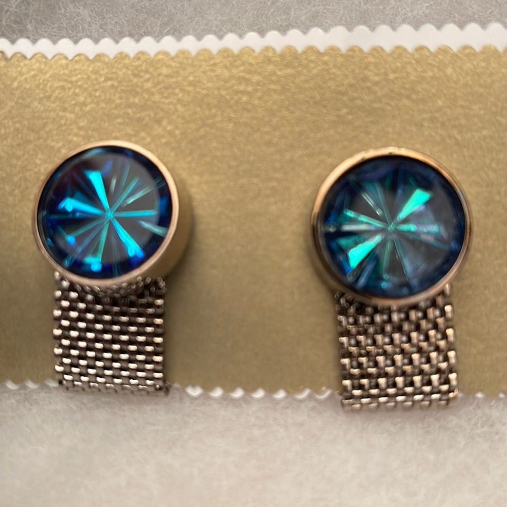 Vintage wraparound mesh cuff links. Silver color with blue faceted glass. New